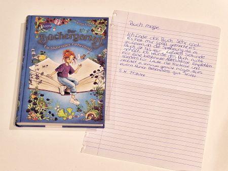 Buch Der Büchergarten mit handschriftlicher Rezension von Testleserin S 11 Jahre
